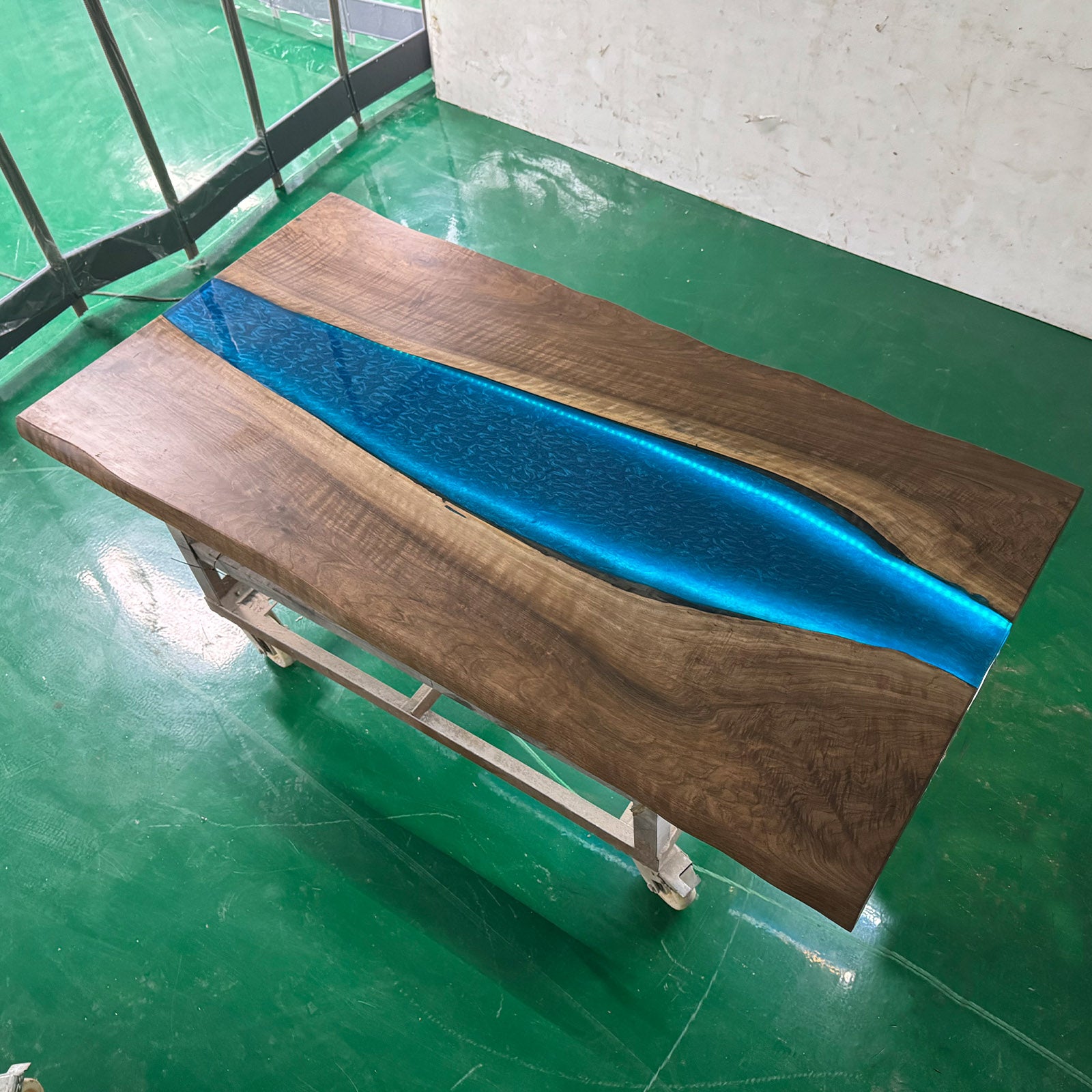 Custom epoxy resin river kitchen table with black walnut wood and LED lights